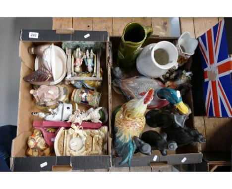 A large collection of continental ceramic items to include large roosters, mallards, tramp style figures, etc. (2 trays)