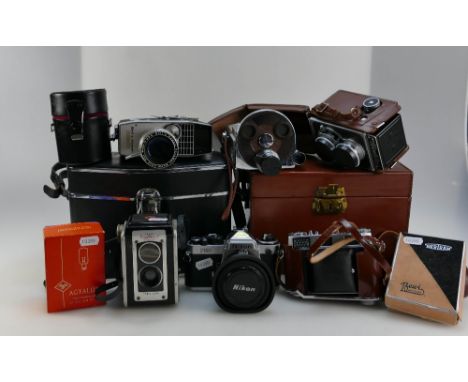 A good collection of vintage film cameras to include Super Ricoh Flex TLR camera, Nikon FE2 SLR camera, Revere 16 Movie camer