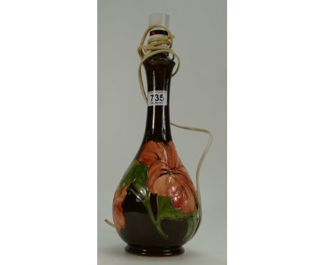 Moorcroft lamp base in the hibiscus design with brown background (height 41cm)