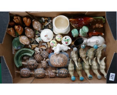 A large mixed collection of Beswick and Wade ceramic figures and decanters to include loch ness monster whiskey decanters, tu