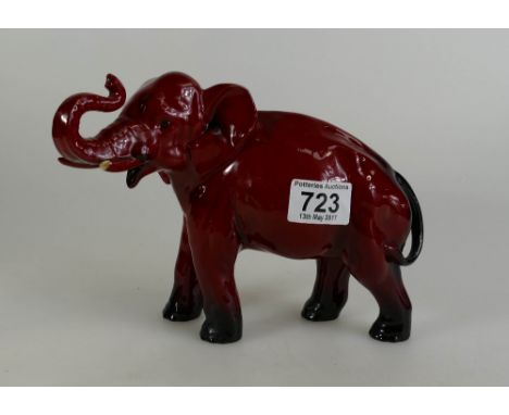 Royal Doulton Flambe Elephant with trunk in salute signed Noke (damaged trunk), height 16.5cm