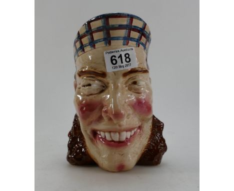 Large ceramic character jug marked "Sarreguemines France 3210" to base 