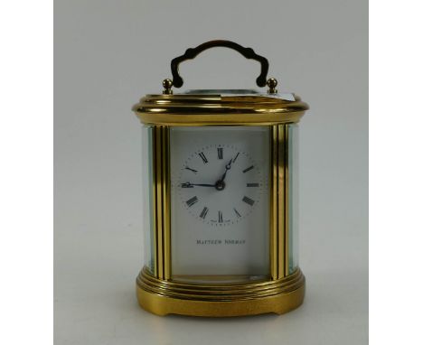 Mathew Norman Oval carriage clock, height 11cm