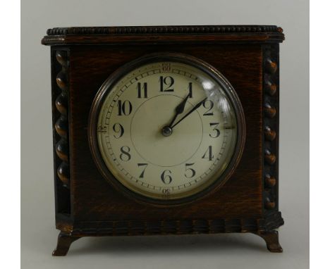 A small oak cased French mantle clock, (small scuff to beading).