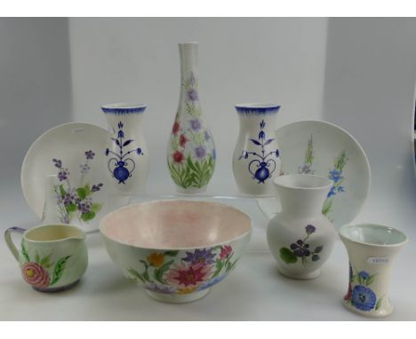 A good collection of Radford and E Radford hand painted items to include fruit bowl, vases, posy baskets, etc.