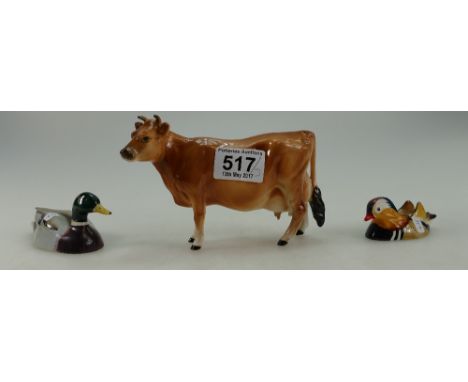 Beswick small Mallard duck 1518 (damaged), small Mandarin duck 1519 and ceramic unmarked cow (3)