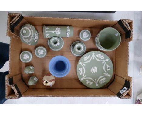 A mixed collection of Wedgwood items to include sage green jasper items, tea caddy, candlesticks, condiment sets, planter tog