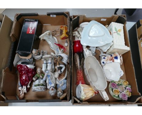 A mixed collection of items to include unbranded ceramic figures, pottery jugs and vases, etc. (2 Trays). 