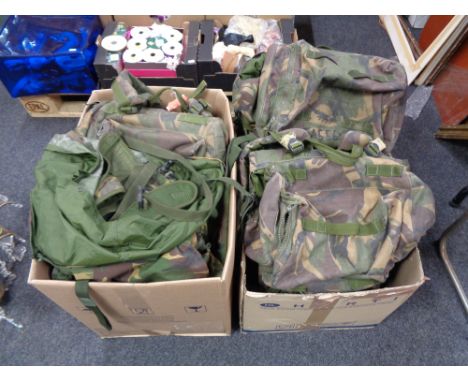 Five army burgens containing webbing 
