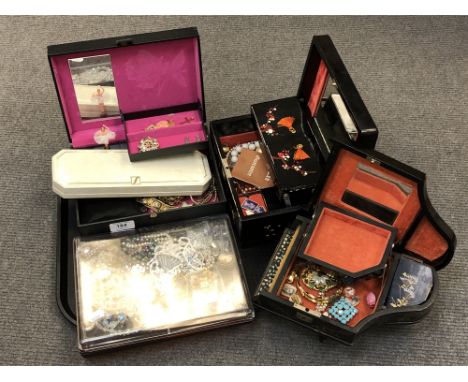 Three various jewellery boxes and a tray containing costume jewellery, compact, stamps etc