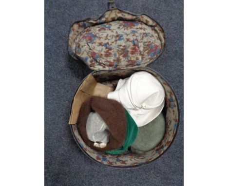 A vintage hat box of lady's hats 