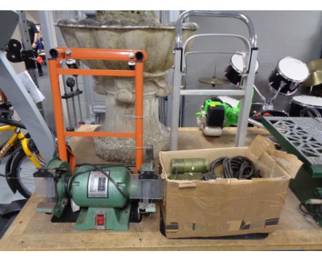 Two folding sack barrows together with a boxed motor and boxed Nu-tool grinder 