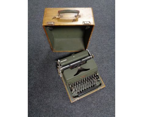 A vintage Hermes 2000 typewriter in case 