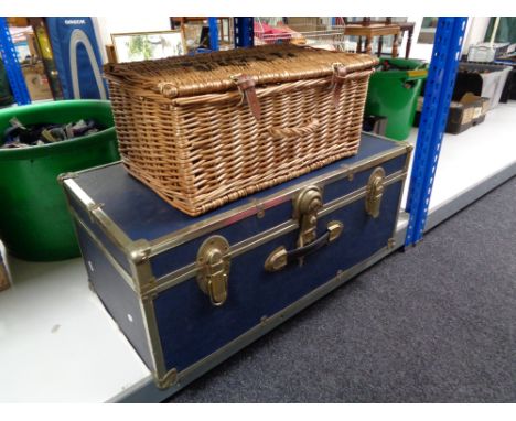 A metal bound trunk together with a wicker Fortnum and Mason hamper 