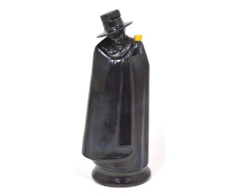 A Royal Doulton 'Sandeman', figural decanter in the form of a caped man wearing a wide brimmed hat, height 25cm.