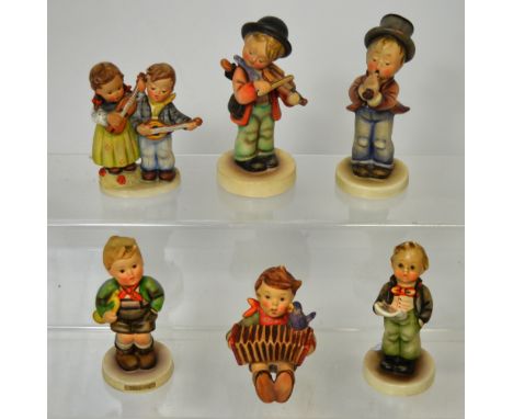 Goebel; six figural studies of girls and boys playing musical instruments by M.J. Hummel to include 'Trumpet Boy', 'Soloist' 