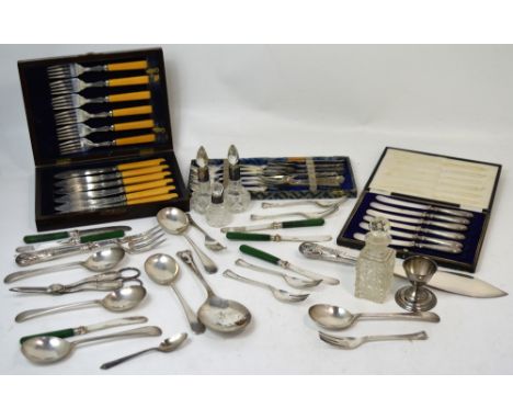A boxed set of silver handled dessert knives and a selection of silver plated flatware, silver mounted bottles etc.