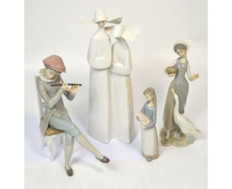 Four Lladró figures, a seated boy playing a flute, a larger pair of nuns, a girl holding a basket with a goose at her feet an