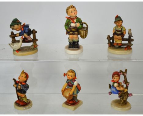 Goebel; six figural studies of girls and boys by M.J. Hummel to include 'Barnyard Hero' and 'Little Hiker' (6).