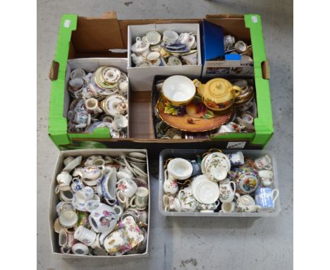 A very large quantity of miniature teapots, cups and saucers, to include examples by Royal Crown Derby, Royal Albert, Royal D