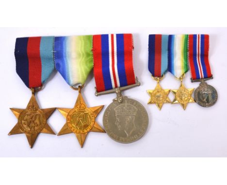 Three WWII medals; the 1939-45 star, the Atlantic star and the 1939-45 War medal, awarded to Captain John Edgar Gould Lenham,