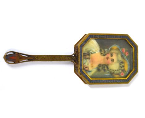 An early 20th century brass and enamel decorated small hand mirror, the rectangular frame with canted corners opposing a port