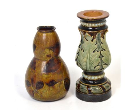 Mary Aitken for Doulton Lambeth; a glazed stoneware candlestick, relief decorated with acanthus leaves and repeating borders 