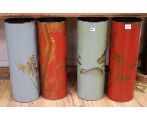 Four Chinese lacquered metal stick and umbrella stands