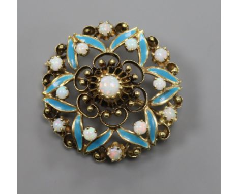 A yellow metal, white opal and blue enamel set openwork flowerhead brooch, 35mm.