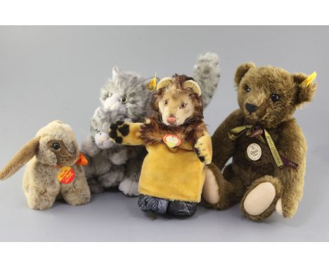 A Steiff collector's bear, a Steiff cat, a rabbit and a lion