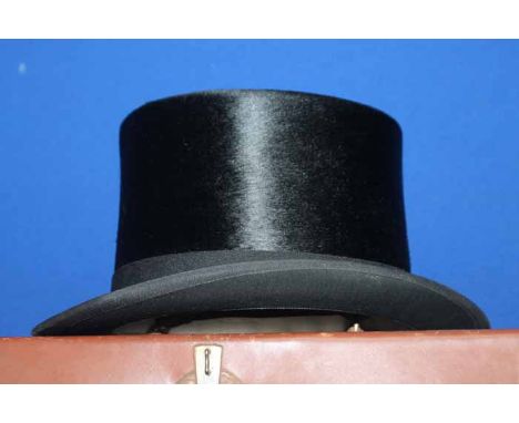 VINTAGE BLACK SILK TOP HAT
inside a tan leather square carry case, case 35cm long