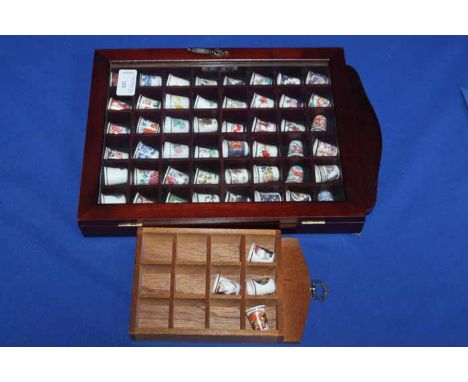 COLLECTION OF ROYAL WORCESTER CERAMIC THIMBLES
housed within a display case; together with a number of similar ceramic thimbl
