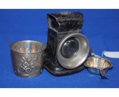 CARBIDE CYCLE LAMP
together with a silver tea strainer and a silver beaker