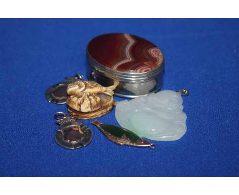 LOT OF BIJOUTERIE 
including an agate set plated box, two fobs, small ivory carving, jade pendant and a fish pendant 