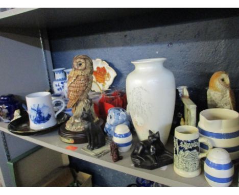 A selection of ceramics and resin ornaments to include a Royal Doulton limited edition porcelain model of a tawny owl, Poole 