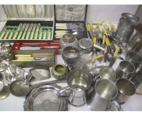 Silver plate and metalware to include tankards, sets of fish knives and forks, a cake slice, a ladle, Aquascutum frame engrav