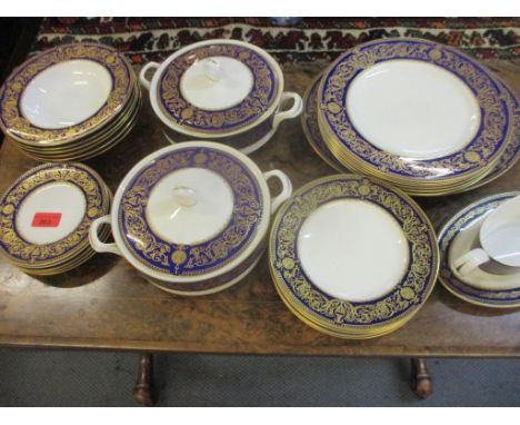 A Royal Worcester Sandringham pattern dinner service comprising six side plates, two tureens, six soup bowls, a gravy boat, a