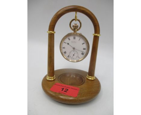 A W.G.Park of Dumfries 9ct gold cased manual wind pocket watch, total weight 80.5g on treen stand having a white dial with Ro