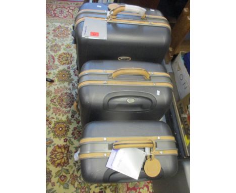 A set of three Samsonite graduating suitcases, titanium colourway, Hommage design, new with original tagsLocation: 