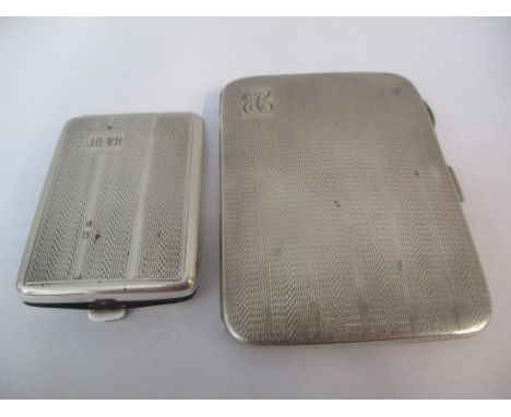 A silver cigarette case and a silver matchbook case each with engine turned decoration, 99gLocation: 