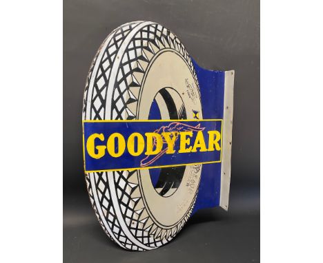 A Goodyear tyres double sided enamel sign with hanging flange, heavily restored, 22 x 34".