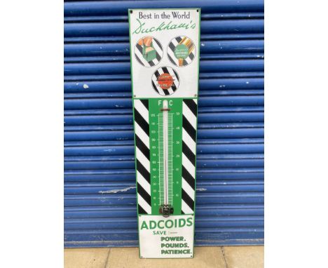 A Duckham's Adcoids black and white thermometer in superb condition, 11 x 45 1/4". 