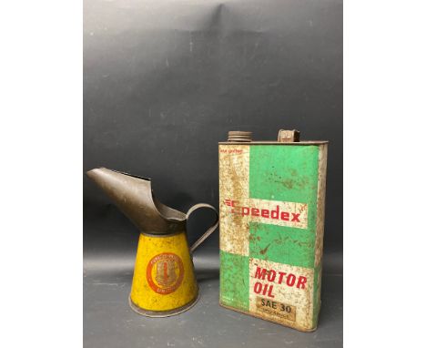 A Speedex Motor Oil gallon can and a Redline Glico quart measure.