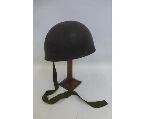 An undated WW2 style British Paratrooper's or Despatch Rider's helmet with liner and chin strap.
