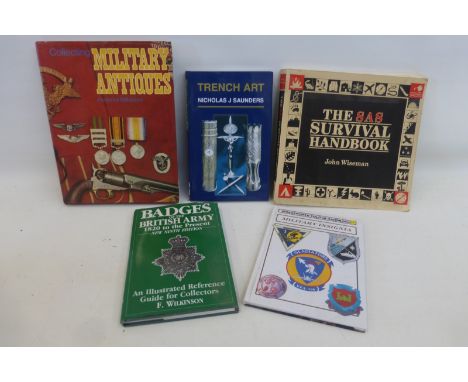 Military books including "Badges of the British Army", "Collecting Military Antiques", "Trench Art" and the "S.A.S. Survival 