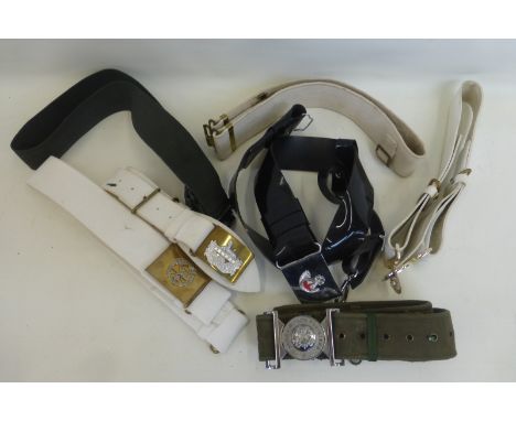Seven British Army belts, some with regimental buckles including: Royal Welch Fusiliers, Light Infantry, Gloucestershire Regi