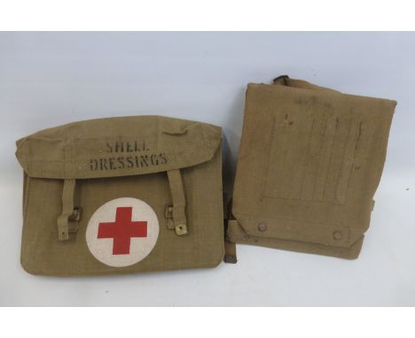 A WW2 British Army map case dated 1944 with a Shell Dressing first aid bag dated 1942.