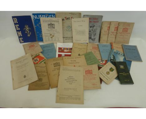 Thirty plus military pamphlets, leaflets and booklets including "Swastika over Guernsey" "1908 U.S. Army Manual of Guard Duty