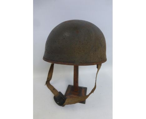 An undated WW2 style British Paratrooper's or Despatch Rider's helmet with liner and chin strap.