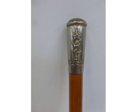 A Royal Corps of Signals swagger stick.